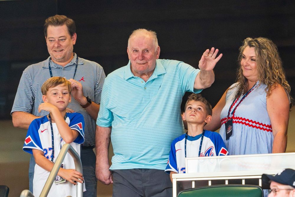 Bobby Cox waves to the crowd