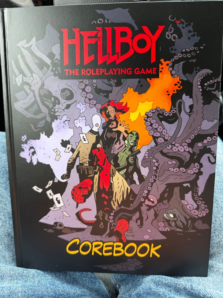 A table top RPG rulebook featuring hellboy. 