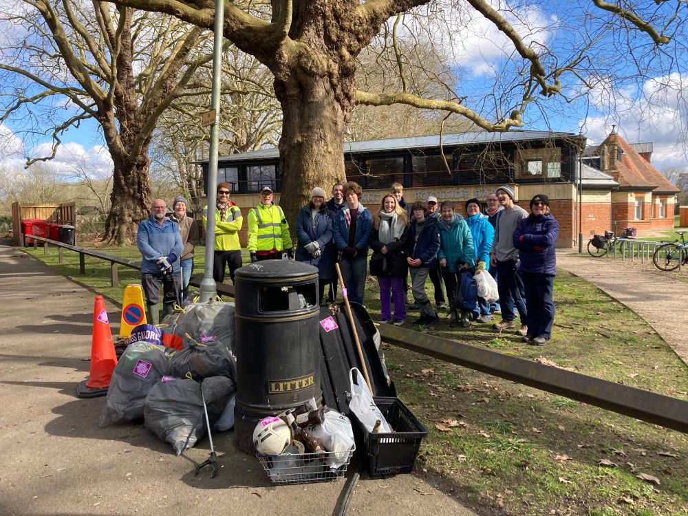 Keep Caversham Tidy stand weirdly behind their collected rubbish