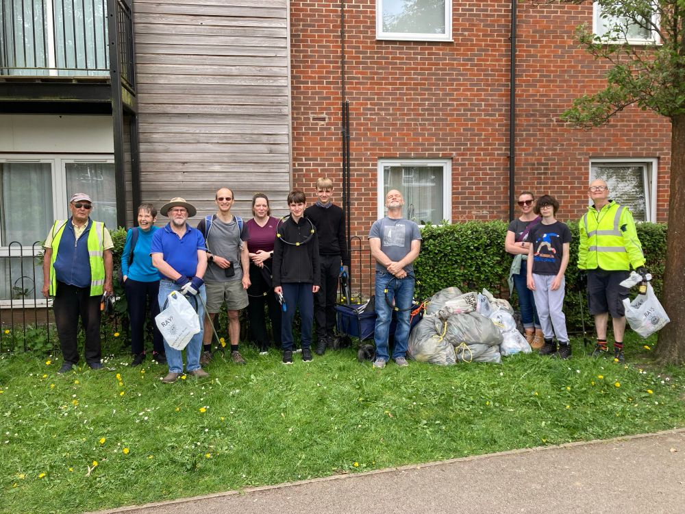 Keep Caversham Tidy stand triumphantly behind their collected litter