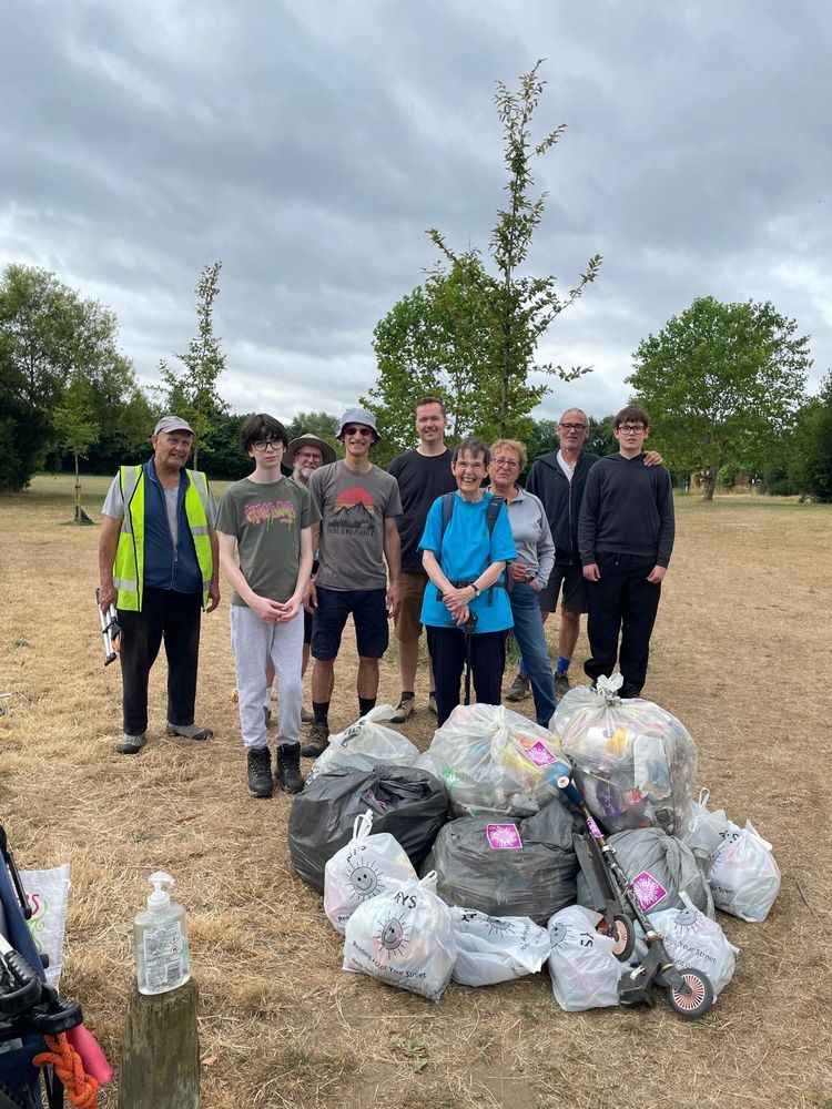 Keep Caversham Tidy volunteers behind a mound of collected litter