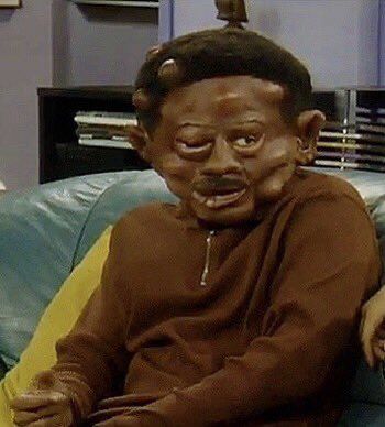 Man with makeup to make him look severely beaten