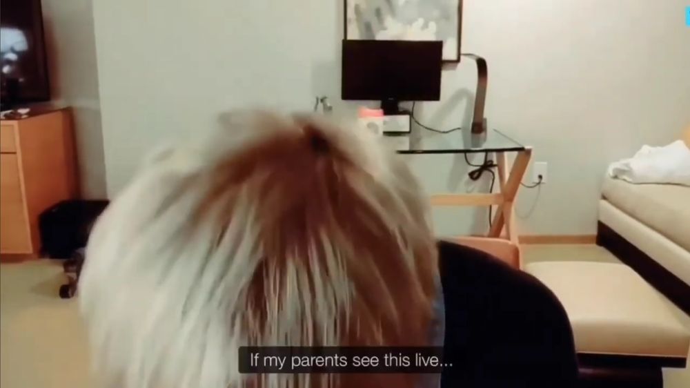 namjoon ducking his head in embarrassment, with the caption "if my parents see this live..."