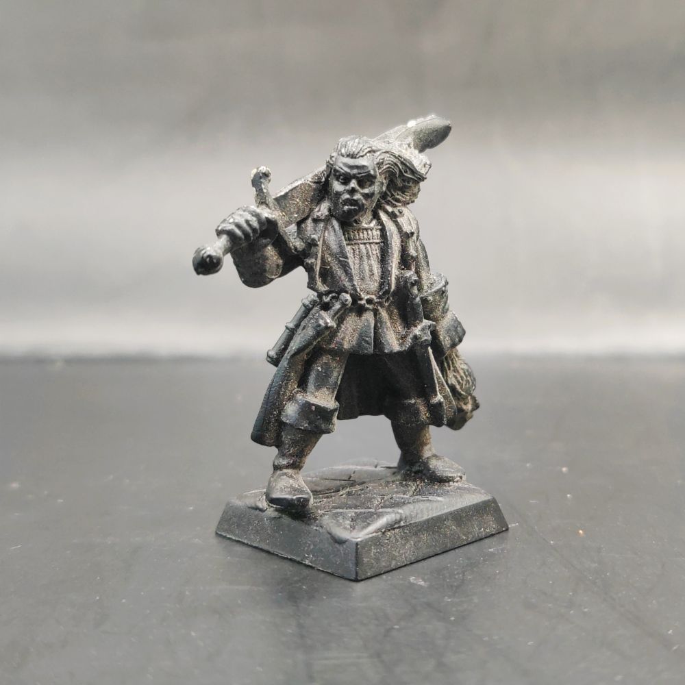 A solemn looking witch hunter captain taking his pet severed head out for a walk.