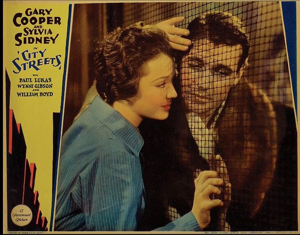 Lobby card for City Streets (1931), starring Sylvia Sidney and Gary Cooper.