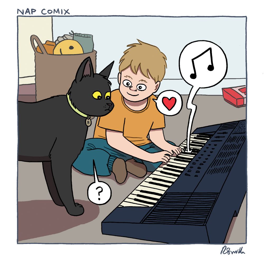 Henry and Rufus playing the keyboard together.