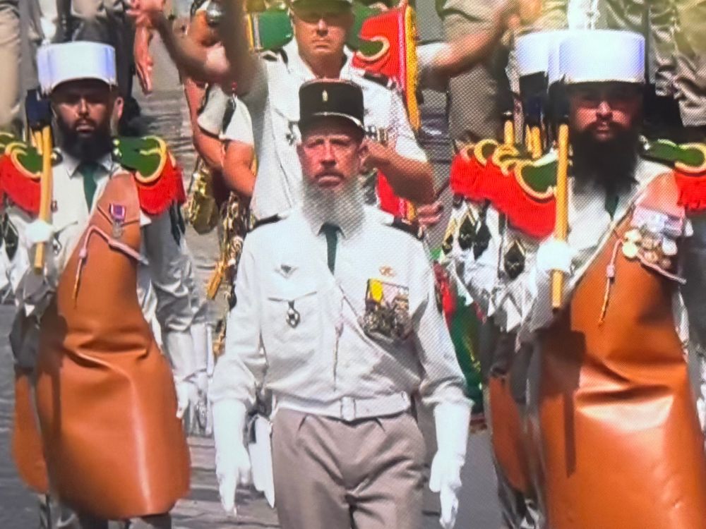 Legion Etrangere on parade on
 Champs Elysees 