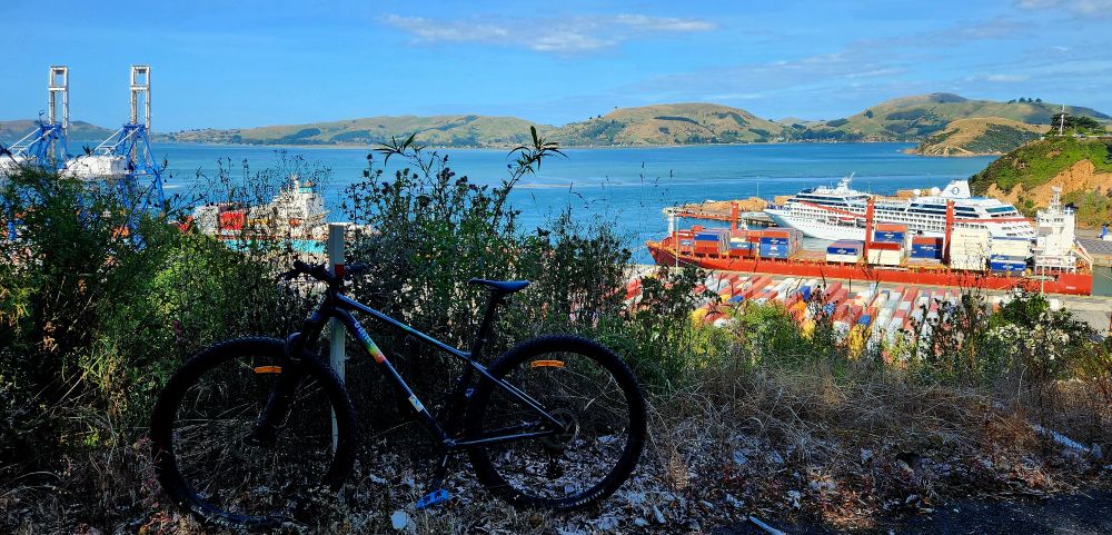 On my bike looking down on Port Otago.