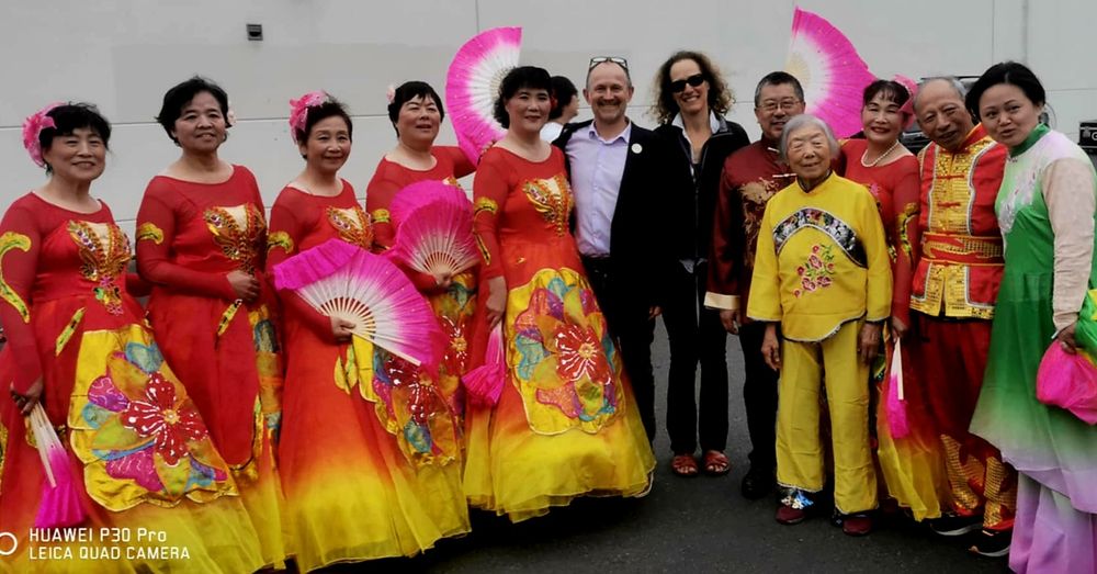 Me and my wife standing with members of the Chinese community.