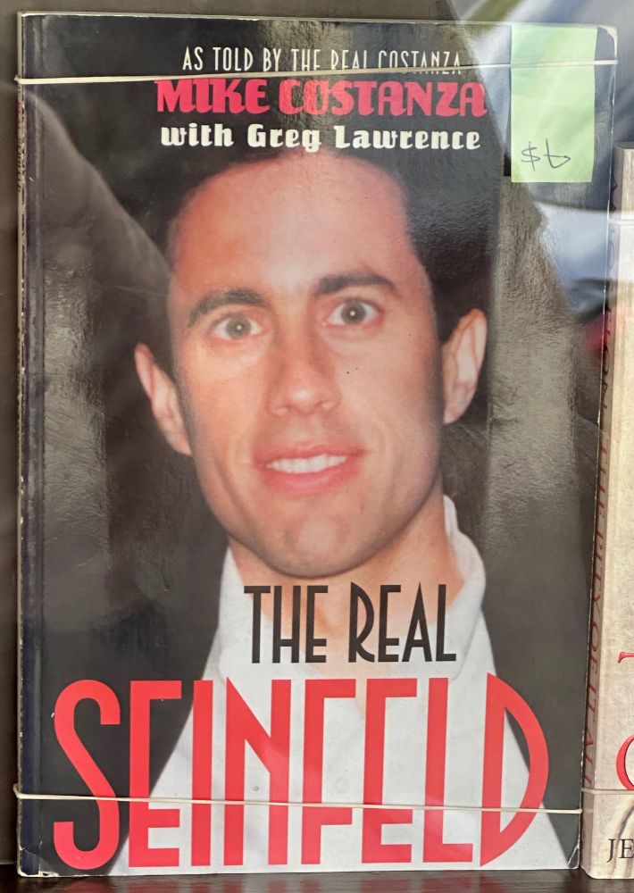 Cheapie biography called The Real Seinfeld "as told by the real Costanza" Mike Costanza with Greg Lawrence. Cover image is a not great photo of Seinfeld's face looking deranged/coked.