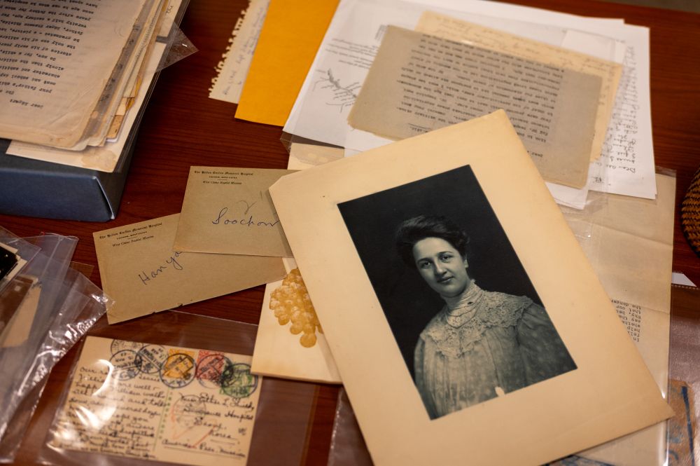 Archival material displayed on a table.