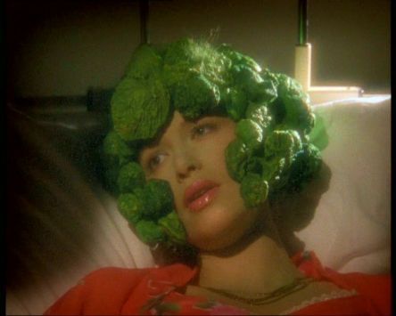 An actress in Garth Marenghi's Darkplace in a hospital bed. Her face and head are covered in broccoli. 