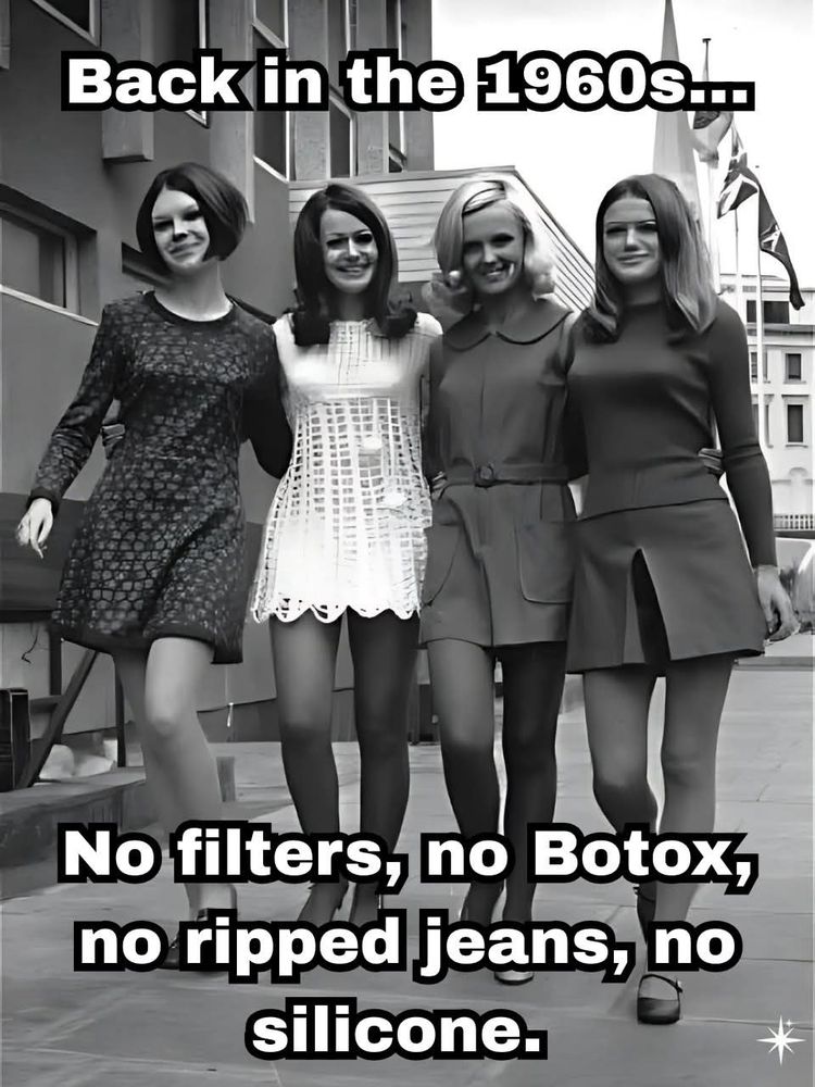 [top]Back in the 1960s...

[bottom]No filters, no botox, no ripped jeans, no silicone

Facebook-tier AI slop, with 4 feminine figures dressed in clothes that weren't from the 1960s, including one that appears to have almost become a hallucinated shuttlecock.

The 4 figures are walking towards the camera, arms behind backs, the two peripheral arms swinging and exposing fucked up hands.

Their faces are garbled, resembling the image of a serial killer wearing the faces of his victims.

Some British flags behind them on poles are only recognisable from the wider context as they're largely garbled.