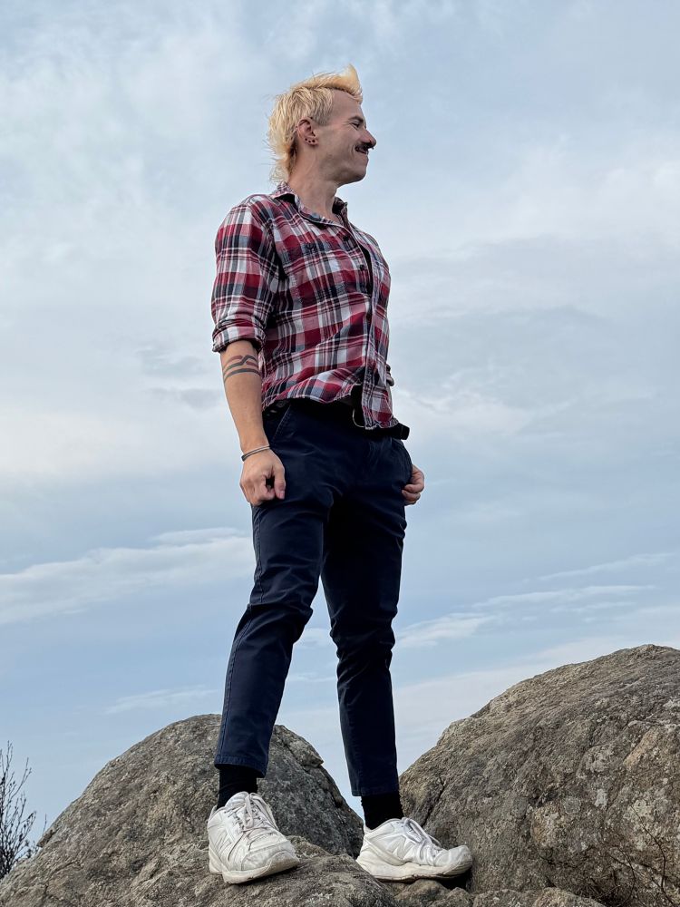 Me on a rock at the top of Mary's Rock. 