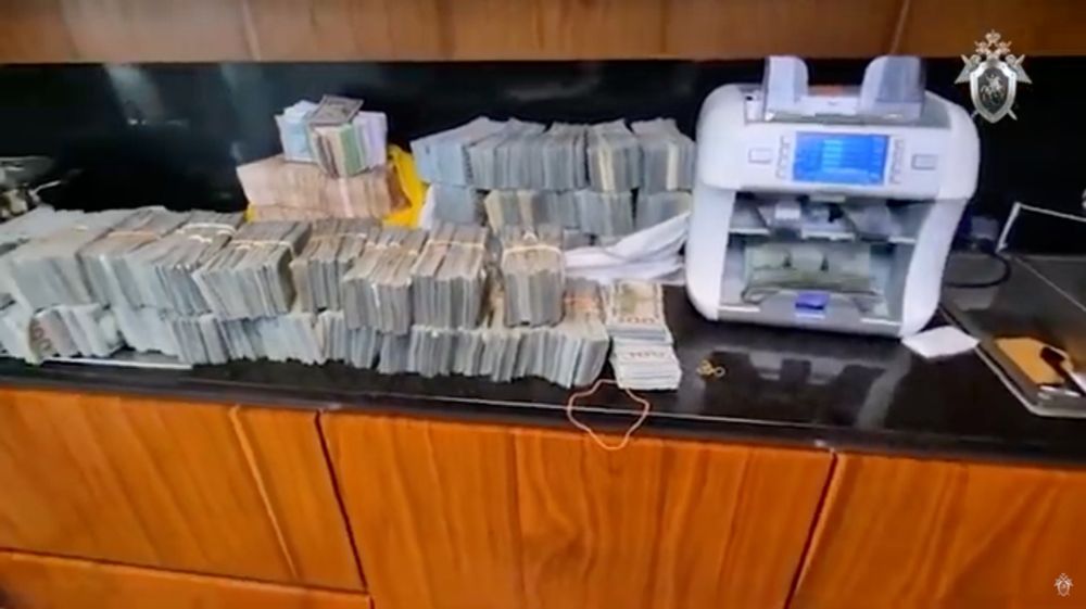 Russian authorities arrest nearly 100 in raids tied to cybercriminal money laundering