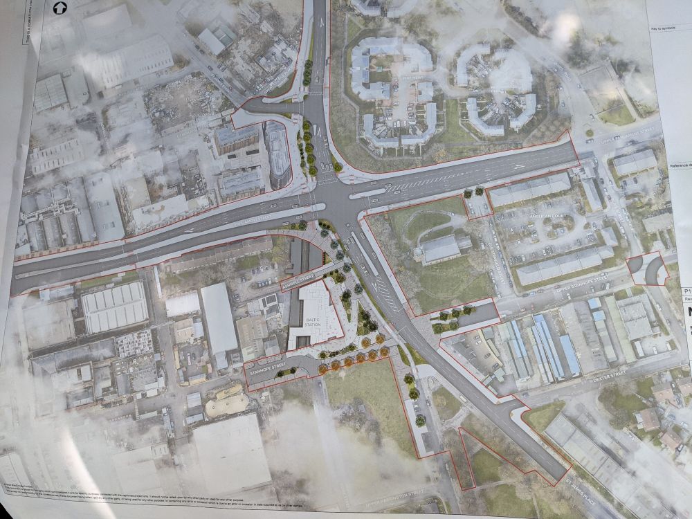 Architects' drawing of proposed road layout changes surrounding the Liverpool Baltic station. The approaches to the four-way junction on the corner of the station site retain 5 lanes of car traffic in all directions. A short stretch of dedicated cycle track is proposed north-south on Great George Street and St. James Place, but no cycle infrastructure is proposed east-west along Parliament Street and Upper Parliament Street.