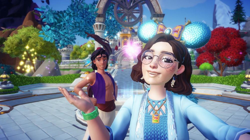 Screenshot of Dreamlight Valley, my character is wearing all blue, and is taking a selfie with Aladdin.