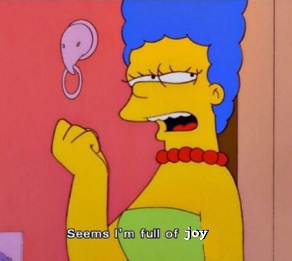 marge looks annoyed with her fist clenched. she says "seems in full of joy"