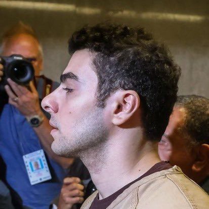 side profile of luigi mangione walking into court on September 16th 2025. image from @fawngiones on twitter