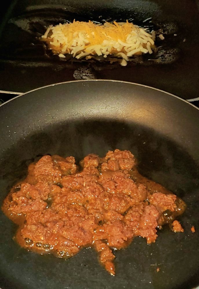 Top: Cheddar and Chihuahua cheeses ready to be grilled. 
Bottom: Turkey chorizo browning.