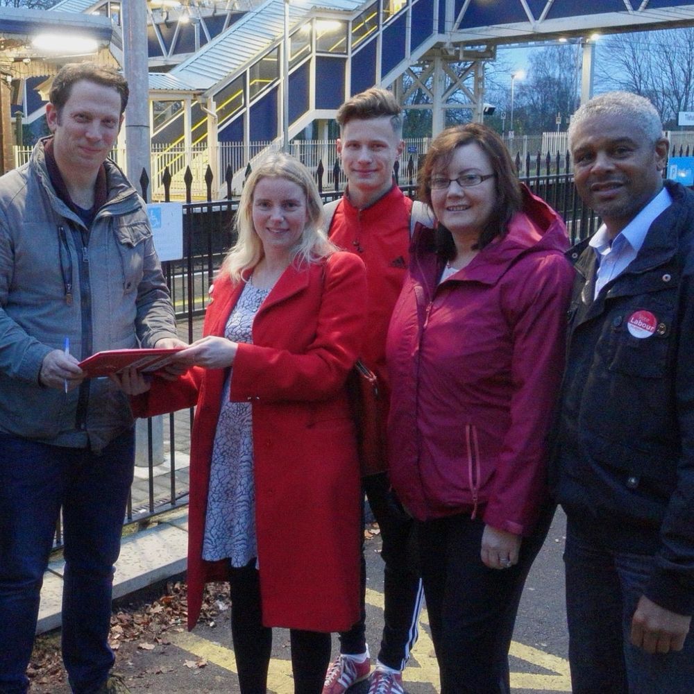 Labour campaigners collecting signatures for a petition at Tilehurst Station. 
