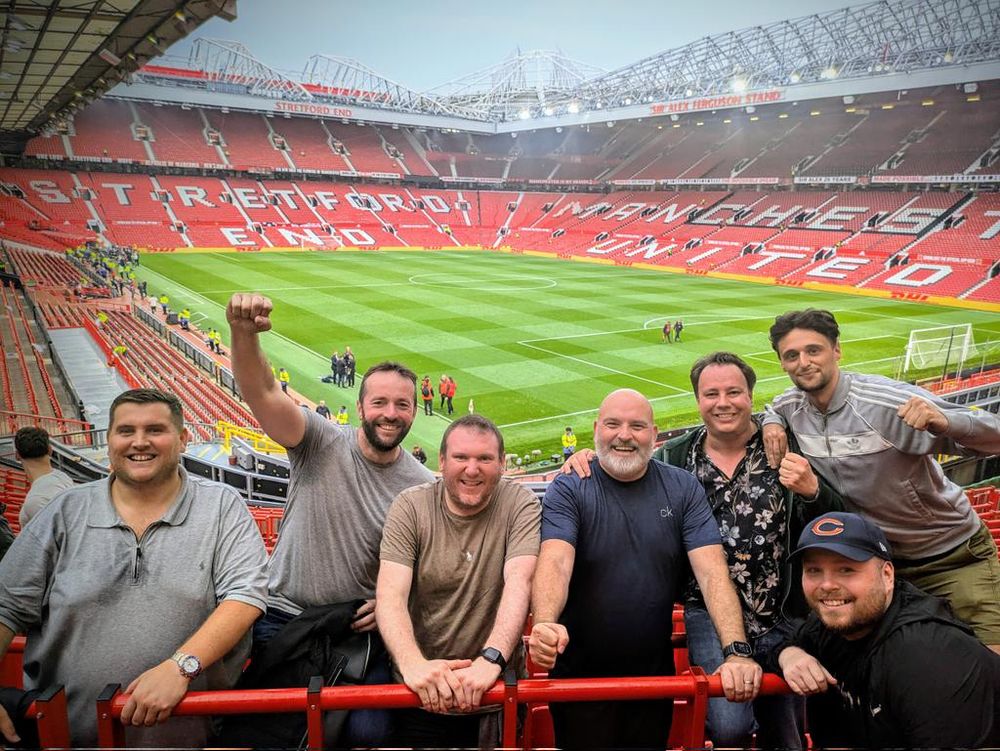 Some divvies stood in the away end at an empty Old Trafford after winning 3-0 