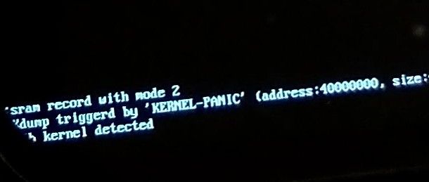 Corner of phone error message partly cut off by rounded corner of screen: 
...sram record with mode 2
Kdump triggered by 'KERNEL-PANIC' (address:40000000, size: ...
... kernel detected