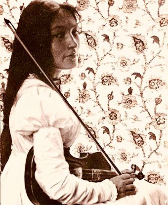 Zitkaála-Šá with her violin, having recently studied at the New England Conservatory of Music. 