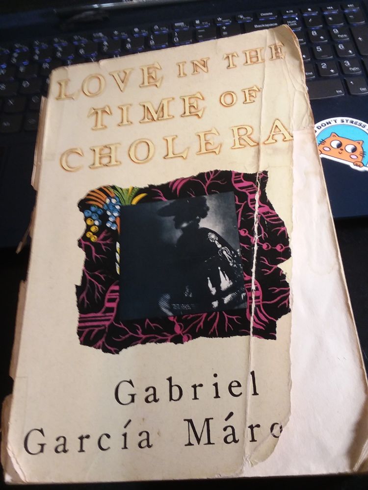 A well-worn copy of the book Love in The Time of Cholera, by Gabriel Garcia Marquez