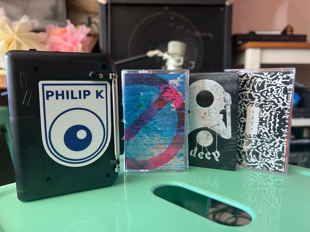A custom PKD tape player and three tapes from Aint Pancakes, DEEP, and HEP LAD.