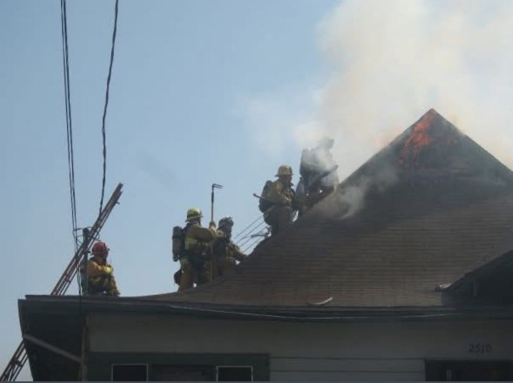 John Knox and team putting out fire.