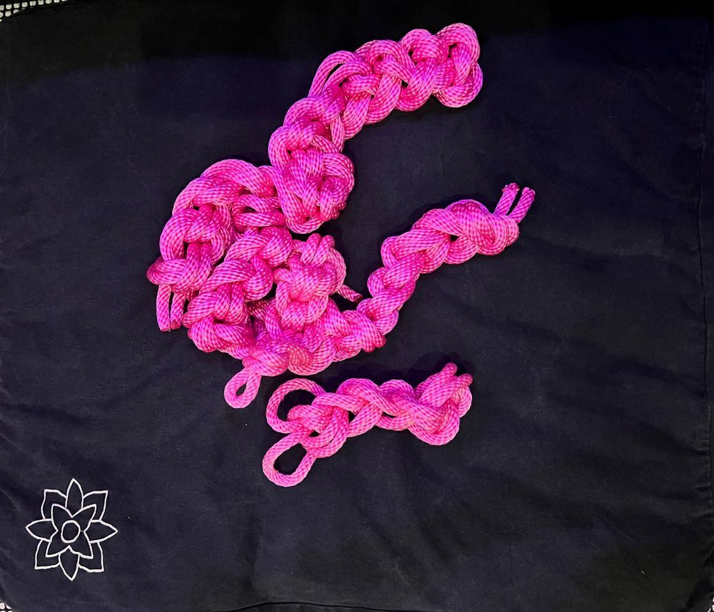 Pink nylon rope on a cushion