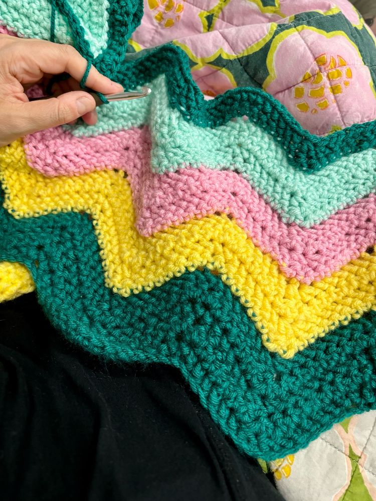 Crochet blanket continued. Teal, yellow, pink and mint ripple stripes