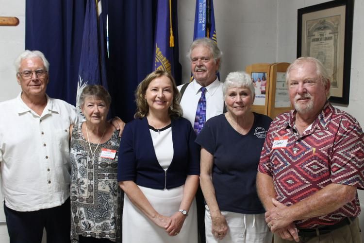(From left to right) John Birch Society members Bruce Budnik and Sure George, Sharon Caldwell, Tom Caldwell, Ensor and Blackwood. 