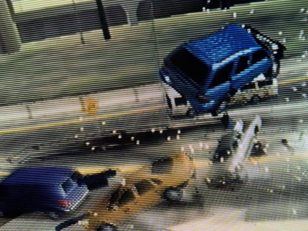 Photo of a CRT telly with Burnout 2's crash mode on it.