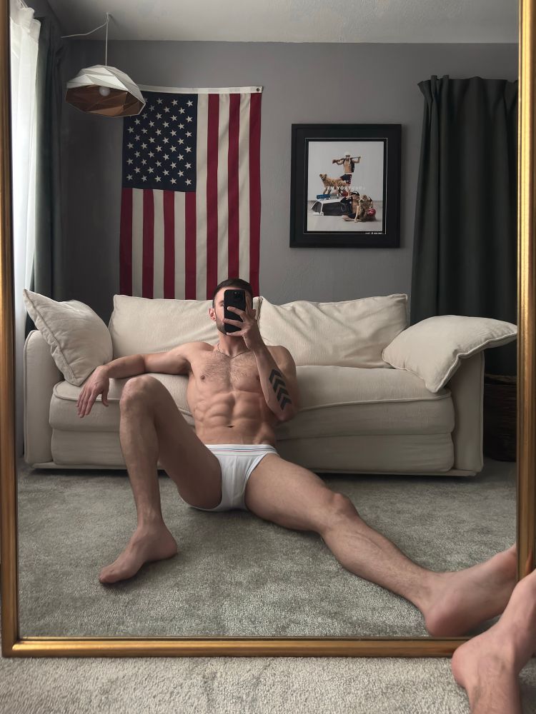 (pre-surgery) young man taking a mirror selfie in his white briefs for National Underwear Day because he doesn’t miss an opportunity to post thirsty content 🙂‍↕️