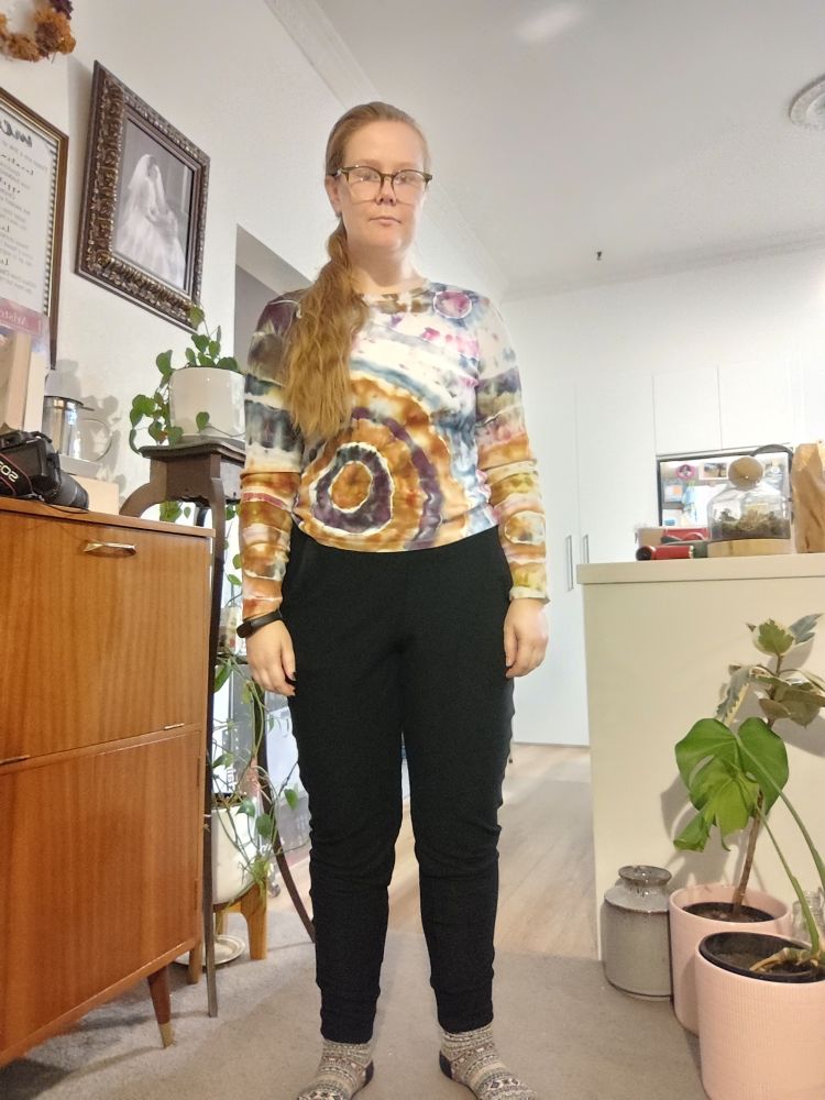 Still wearing them, but straight now instead of posed.