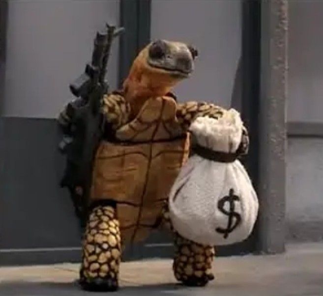 tortoise with gun and bag of money.