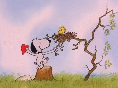 Snoopy slaps a Valentine's Day heart on woodstock