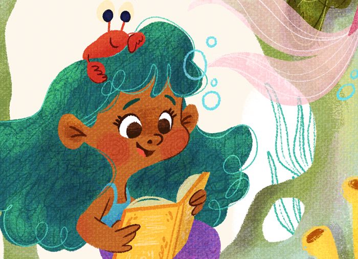 close up of the mermaid reading with the crab friend on her head 