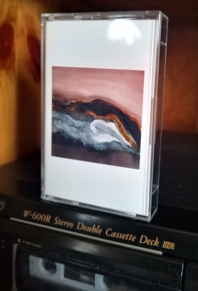 Apologist - Air Foundry cassette plays on a TEAC cassette deck with the case sat on top of the deck 