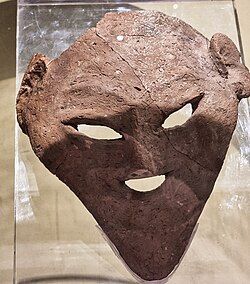 Image of a clay mask from Predynastic Egypt.