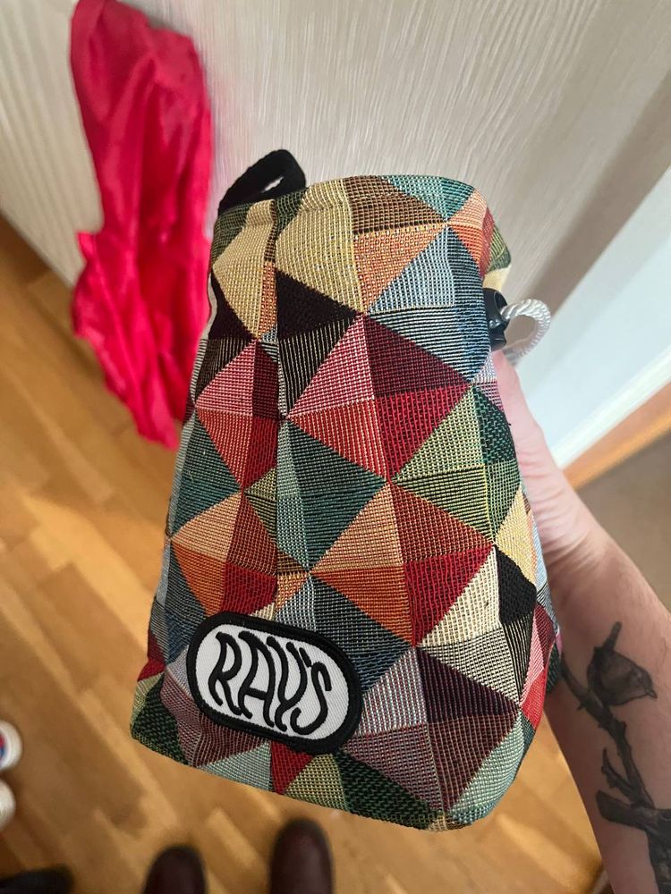 chalk bag from Ray’s Climbing, multicolour diamond pattern on it 