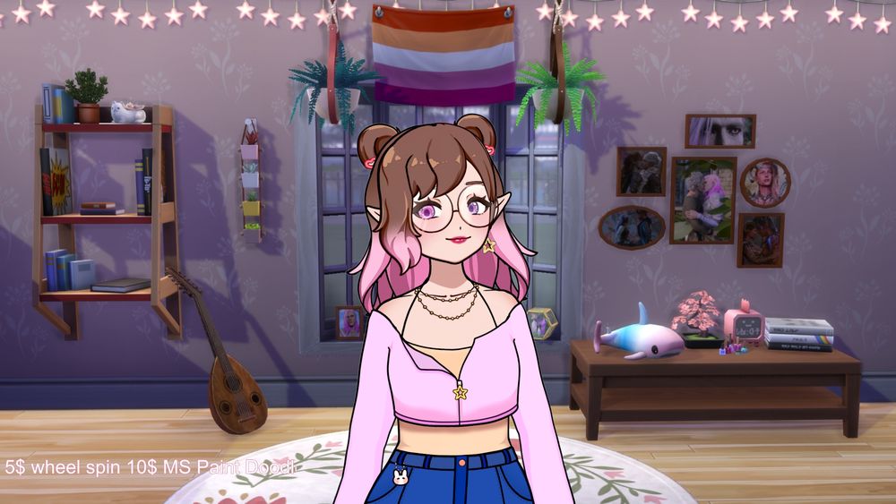 Ames' vtuber, a white feminine presenting elf wearing a light pink cropped hoodie over a yellow tanktop and a blue jean skirt. Their hair is brown and fades into pink at the ends. They have two space buns pinned with red heart clips. The background is a screenshot from the sims 4 of a room with purple wallpaper and brown flooring with a circular rug. On ne side is a table with knickknacks and the otherside has a bookshelf. Their is a cluster of frames featuring their Baldur's Gate 3 characters on the wall. Directly behind her is a bay window with the lesbian flag at the top of it.