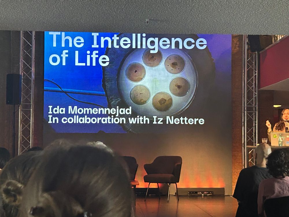 A presentation of a talk with a slide that reads: the intelligence of life