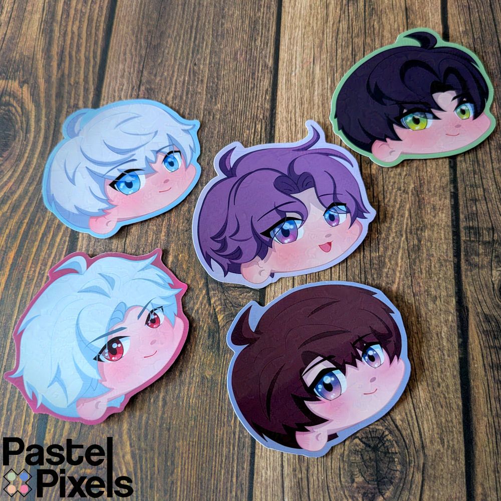 5 stickers lay on a wooden background. Each of the 5 stickers is a cute illustration of the characters from Love and Deepspace