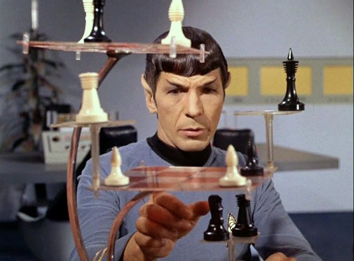 A still from Star Trek the original series in which Mister Spock is about to make a sick move in 3d chess while making a sick burn