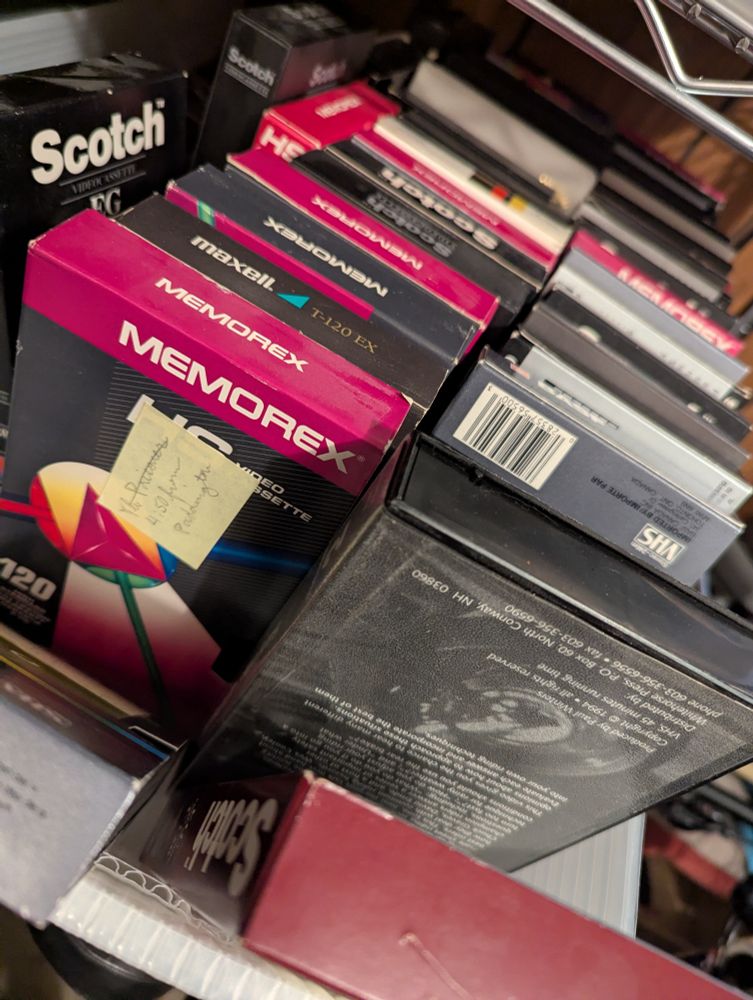 The author's madness on full display in the form of a mail sorting tray filled with VHS tapes that were once "current project"
They are currently not.
