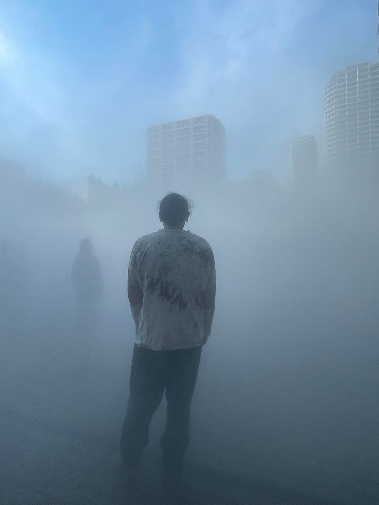 Fog in an outside space with my partner standing