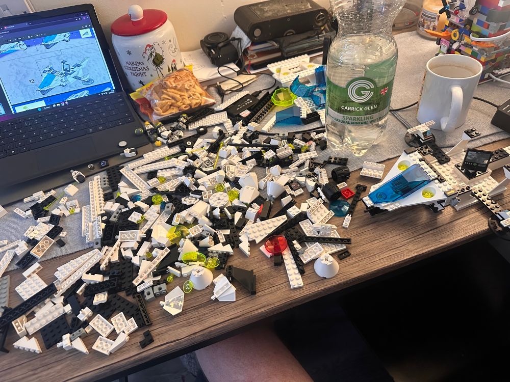 All the pieces off lego from set 6982 all spread across the table